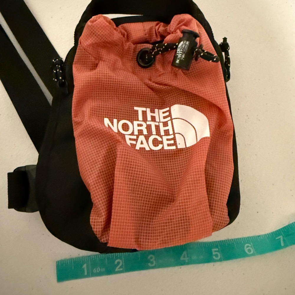 The North Face Orange and Black Drawstring Bag